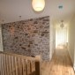 Quarry picked stone wall on the first floor landing quarry picked stone wall