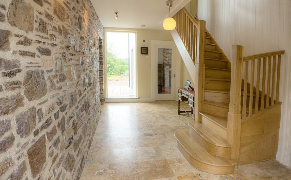 Salvaged stone wall in the entrance hall salvaged stone wall