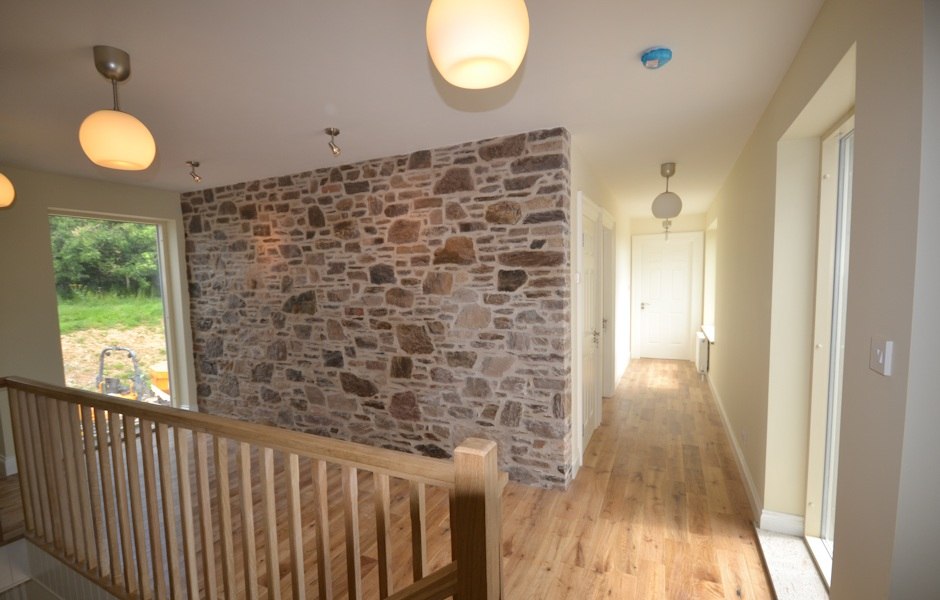 Quarry picked stone wall on the first floor landing quarry picked stone wall